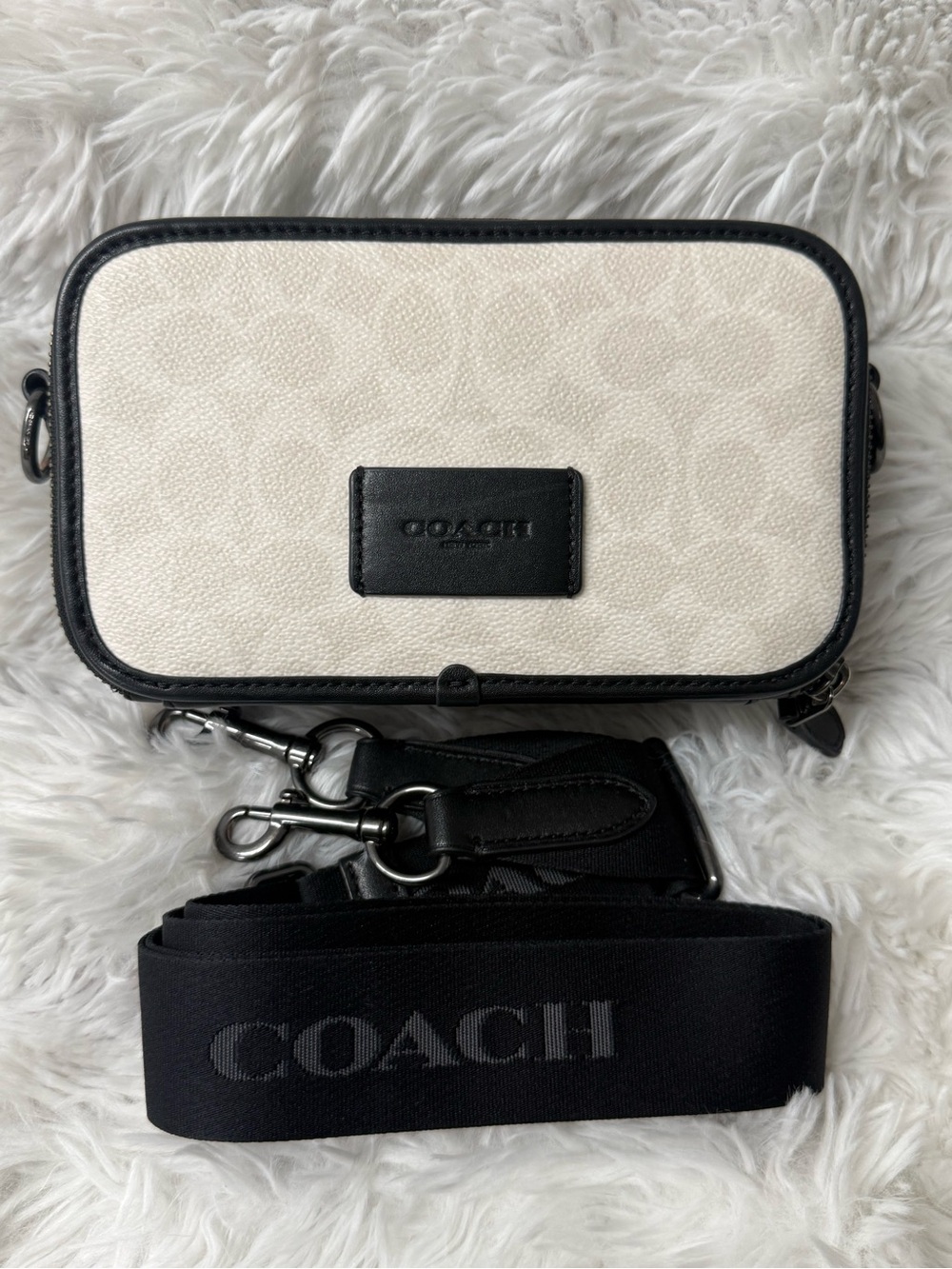 Coach Wyatt Cream Signature Crossbody with Black Trim.